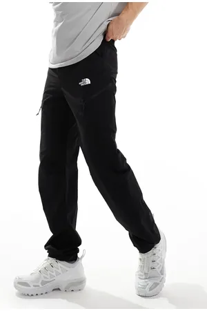 The North Face Pantalones negros de corte tapered con bolsillo cargo Exploration de