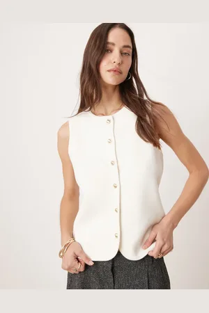 Abercrombie & Fitch Cárdigan color sin mangas con cuello subido y botones dorados de punto de -Blanco