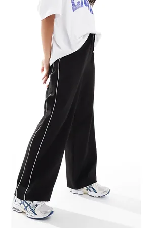 Miss Selfridge Joggers de sastre negros con rayas laterales de