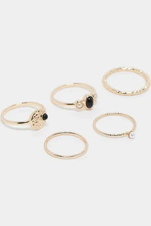 ASOS Pack de 5 anillos dorados con piedras negras y perlas de imitación de