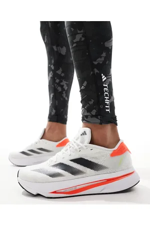 adidas Zapatillas de deporte blancas y naranjas Adizero SL2 de adidas Running