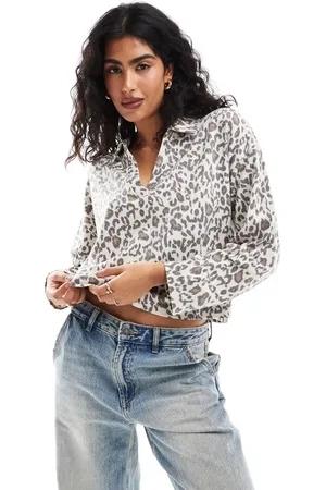 ASOS Polo con estampado de leopardo de tejido suave de -Multicolor