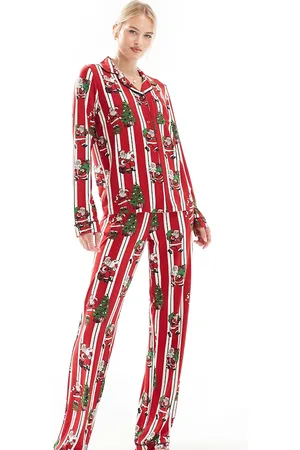 Chelsea Peers Pijama de top de manga larga con cuello de solapas y pantalones a rayas con estampado navideño de Papá Noel de poliéster His & Hers de