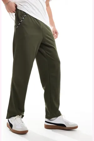 PUMA Joggers verde oliva con detalle de cinta PWRFleece Lite de