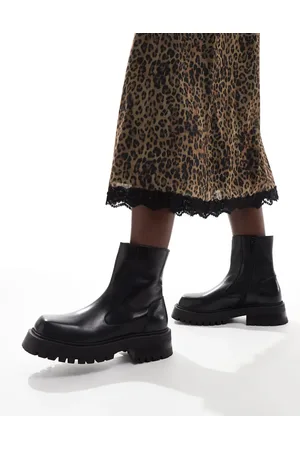Schuh Botines negros de cuero son suela gruesa Alicia de
