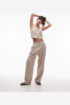MANGO Pantalones de sastre claro de corte alargado y holgado de mezcla de tejidos de (parte de un conjunto)- neutro