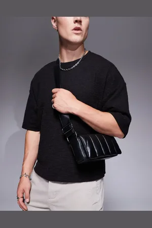 ASOS Bandolera negra con diseño guateado de cuero de