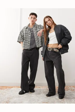 Weekday Pantalones negros unisex de pernera ancha de pana Astro de