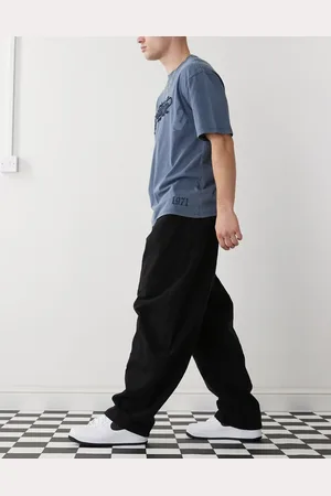 COLLUSION Pantalones negro lavado de corte globo con diseño dividido y costuras de