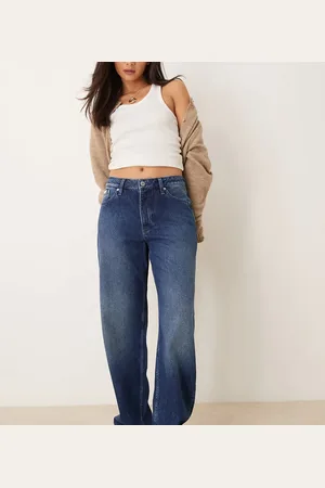 Calvin Klein Vaqueros de corte suelto y estilo años 90 con lavado azul medio exclusivos en ASOS de -Negro