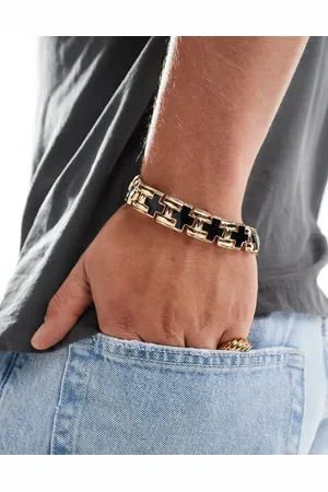ASOS Pulsera dorada gruesa con diseño de cruces de