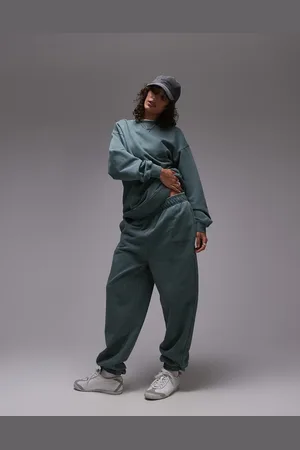 Topshop Joggers verdes con bajos ajustados y estampado gráfico Community de (parte de un conjunto)