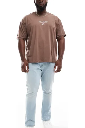 Tommy Hilfiger Vaqueros de corte tapered slim con lavado claro Austin de Plus-Azul