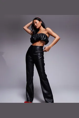 River Island Pantalones de campana negros sin cierres de cuero sintético de
