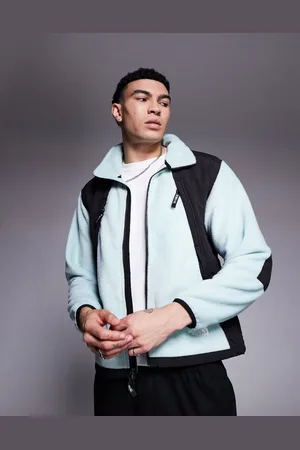 The North Face Chaqueta polar azul con bolsillo de tejido grueso Polar Sun de