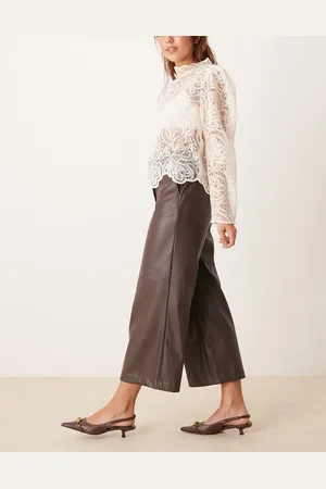New Look Pantalones oscuro de corte culotte y pernera ancha de tejido efecto cuero de