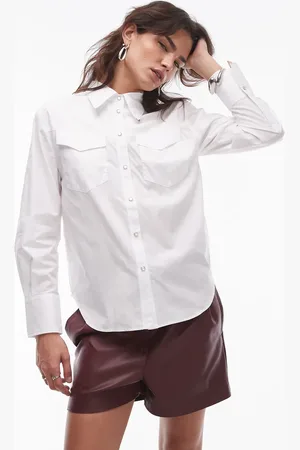 MANGO Camisa blanca con ribetes en las solapas de estilo wéstern de