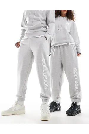 COLLUSION Joggers jaspeado con logo de Unisex (parte de un conjunto)