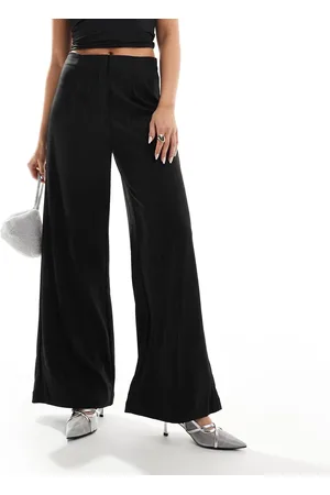 VERO MODA Pantalones negros de pernera ancha con raya diplomática brillante de
