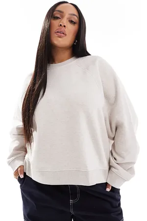 ASOS Sudadera color extragrande con detalle de mangas raglán de ASOS DESIGN Curve-Beis neutro
