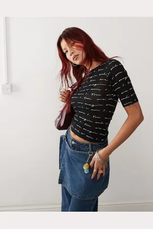 Monki Camiseta negra de corte slim con estampado gráfico de texto de tejido transparente de