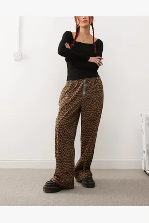 COLLUSION Pantalones multicolores sin cierres con estampado de leopardo y detalle en contraste en la cintura de