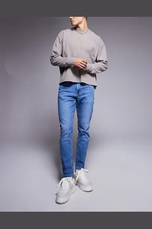 River Island Vaqueros azul medio de corte slim de