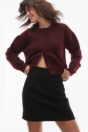 & OTHER STORIES Minifalda negra con bolsillos de