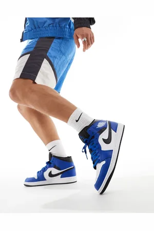 Jordan Zapatillas de deporte blancas, azules y negras Air 1 Mid de
