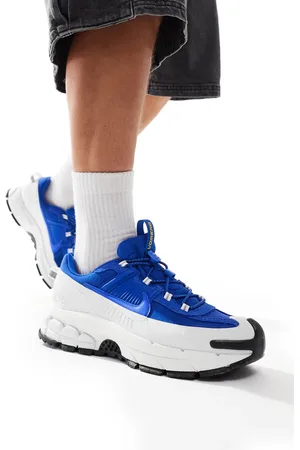 Nike Zapatillas de deporte azules y blancas Zoom Vomero 5 de