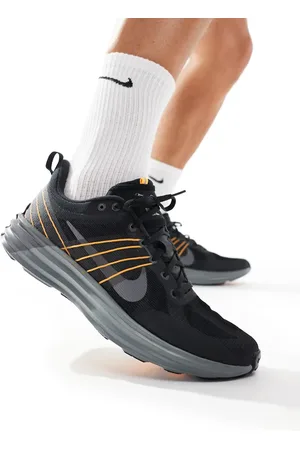 Nike Zapatillas de deporte negras y grises Lunar Roam de