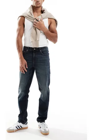 ASOS Vaqueros de corte slim con lavado azul oscuro tintado de