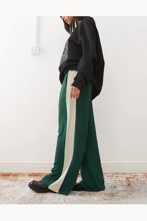 Reclaimed Pantalones verdes de pernera ancha con panel en contraste de