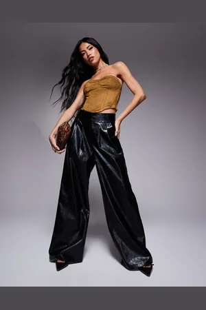 River Island Pantalones negros de pernera ancha de cuero sintético de