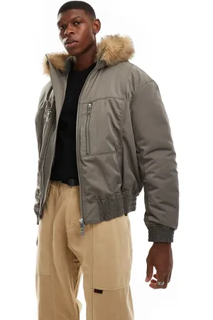 Weekday Chaqueta bomber acolchada con ribete de piel sintética en la capucha de -Verde