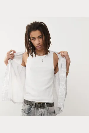 COLLUSION Camiseta blanca sin mangas de canalé de