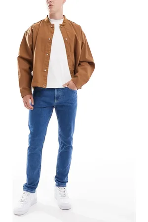 Tommy Hilfiger Vaqueros azul medio tapered de corte slim Austin de