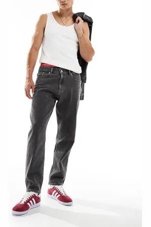 Tommy Hilfiger Vaqueros negros de corte tapered holgado Isaac de