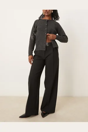 MANGO Pantalones negros de pernera recta con hebilla en la cintura de