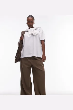 MANGO Pantalones marrones holgados con cinturilla elástica con lazada de Curve