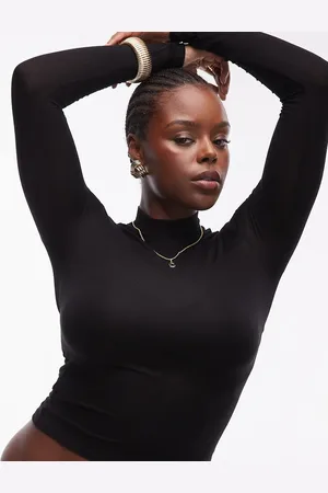 MANGO Top con cuello alto de tejido suave de Curve