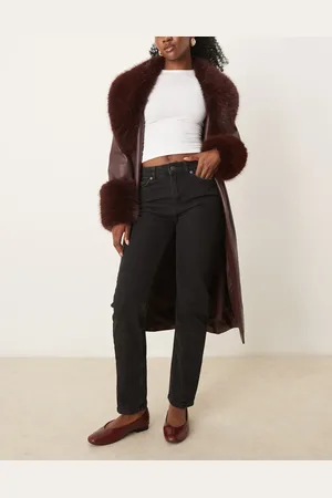SELECTED Vaqueros negros de corte slim con detalle asimétrico de Femme