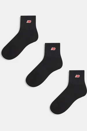 New Balance Pack de 3 pares de calcetines negros tobilleros con logo rojo de canalé de