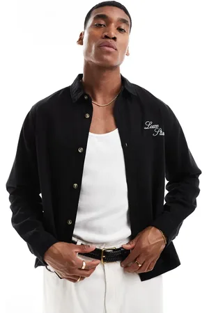ASOS Sobrecamisa vaquera negra de corte cuadrado con bordado en el pecho de