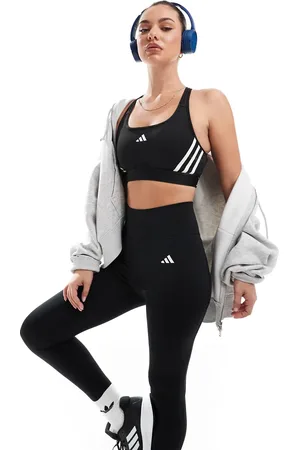 adidas Sujetador deportivo de sujeción media con detalle de 3 rayas Essentials de adidas Training