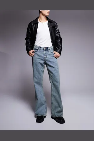 ASOS Vaqueros de campana azul claro de corte ancho con tintado vintage de