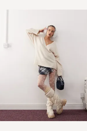 Monki Jersey de corte suelto extragrande con cuello de pico de