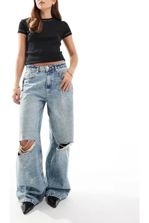 ASOS Vaqueros holgados con salpicaduras de pintura y detalles rasgados de
