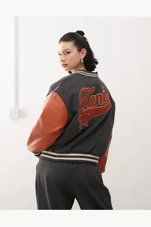 Karl Kani Chaqueta negra de estilo universitario con logo retro de estrella de