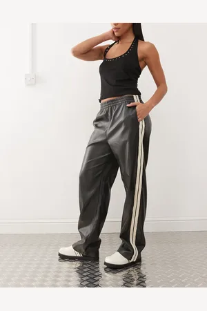Noisy May Pantalones negros de pernera ancha con rayas laterales de cuero sintético de